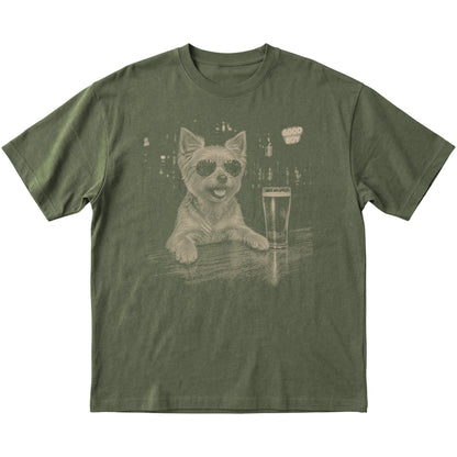 Military Green Yorkie at a bar beside a pint, laid flat