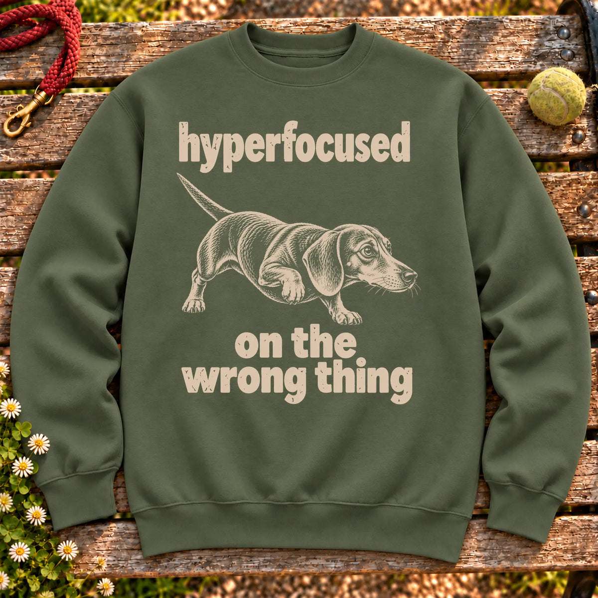 Military Green sweatshirt with Dachshund “hyperfocused on the wrong thing” design