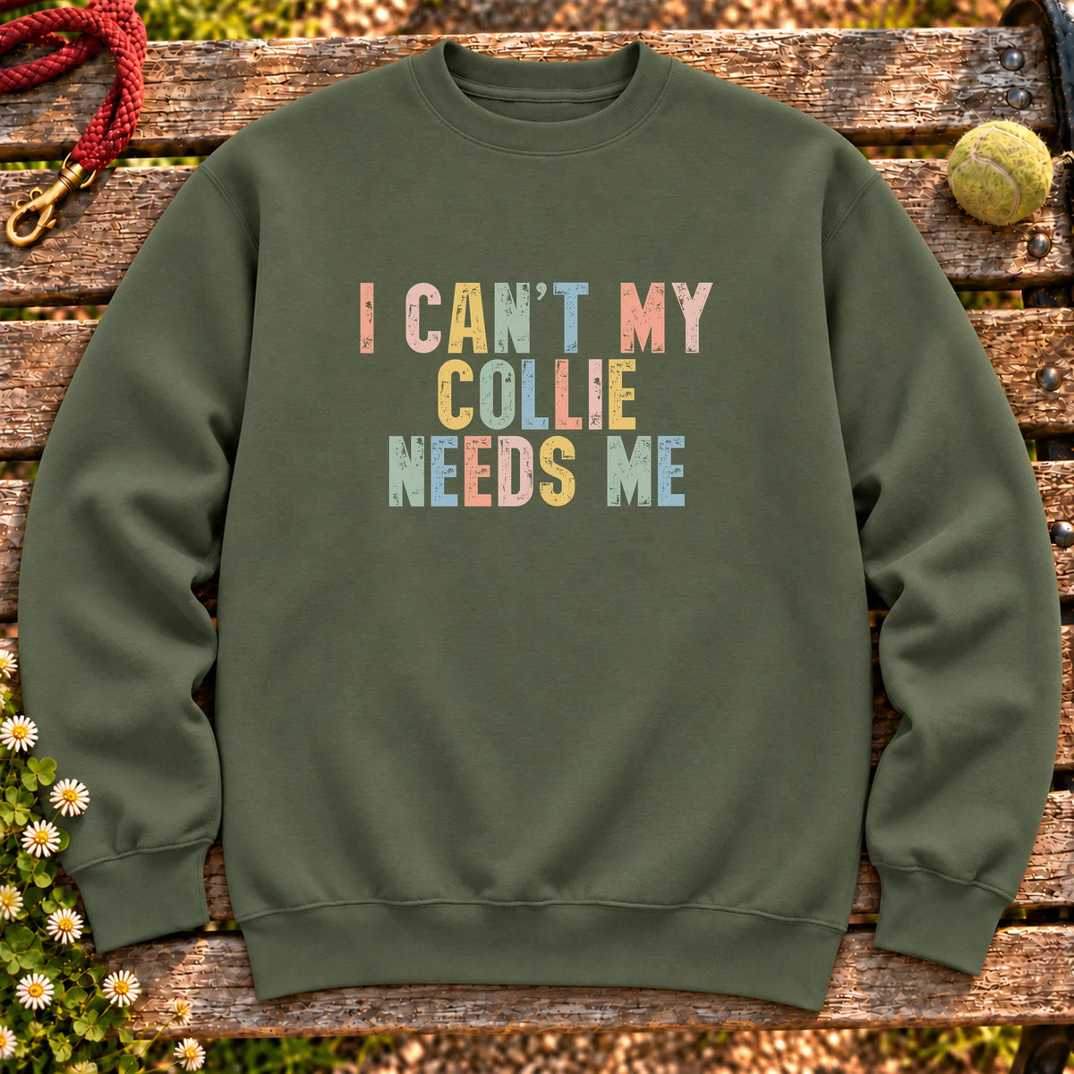 I Can't My Collie Needs Me text design on a Military Green crewneck sweatshirt