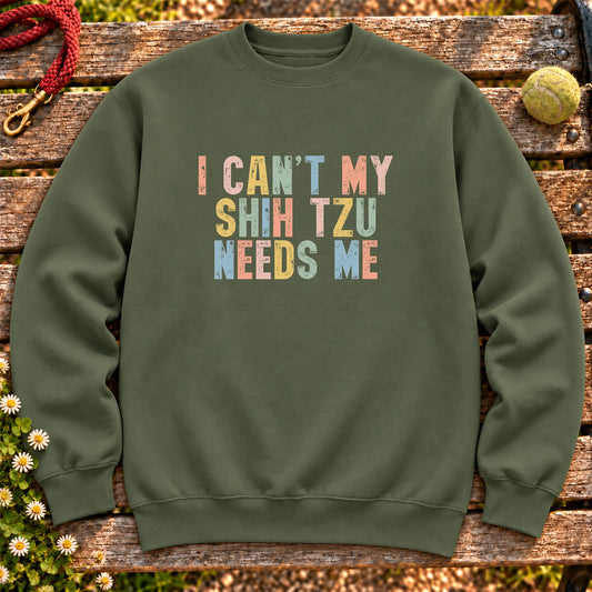 I Can't My Shih Tzu Needs Me text design on a Military Green crewneck sweatshirt