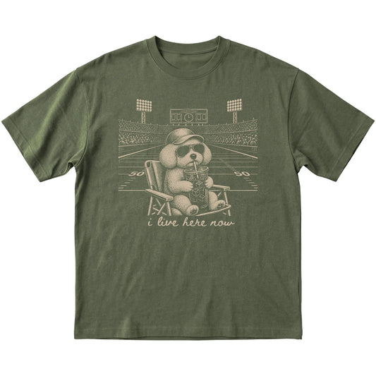 Military Green I live here now Bichon Frise T-shirt, laid flat