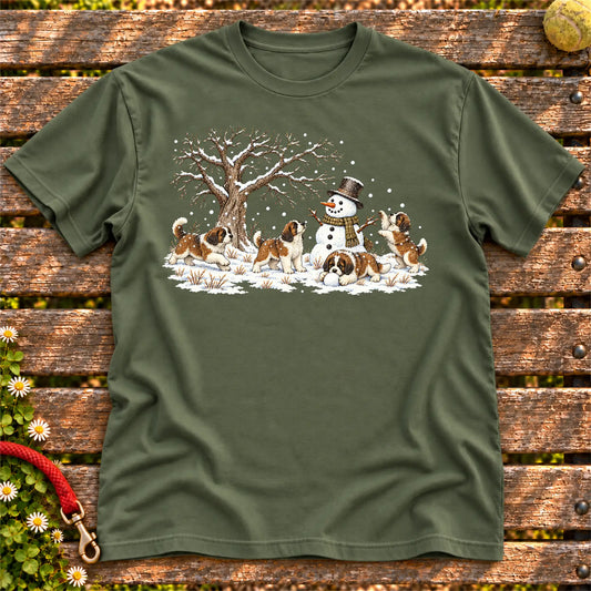 Saint Bernard puppies playing in snow with a snowman on a Military Green T-shirt