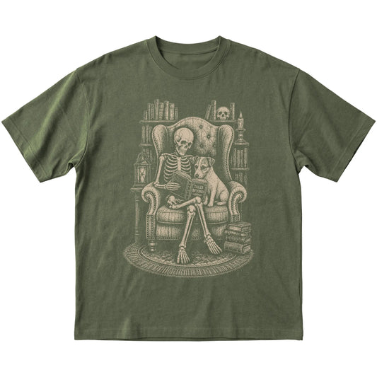 Skeleton reading Tales Beyond to a Jack Russell on a Military Green T-shirt