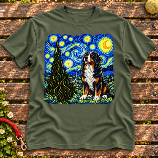 Colorful Bernese Mountain Dog beneath a swirling starry night sky on a Military Green T-shirt