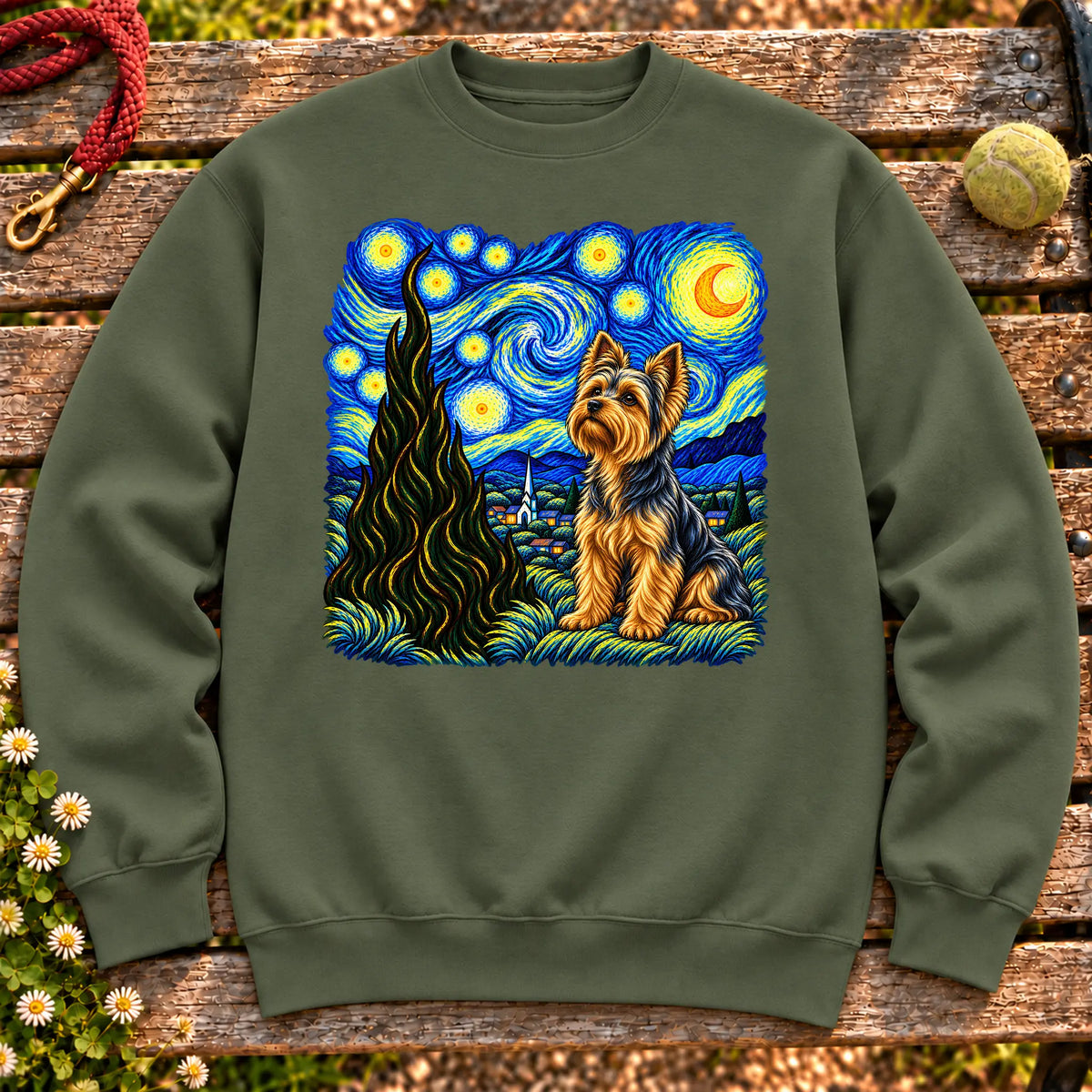 Colorful Yorkie beneath a swirling starry night sky on a Military Green sweatshirt
