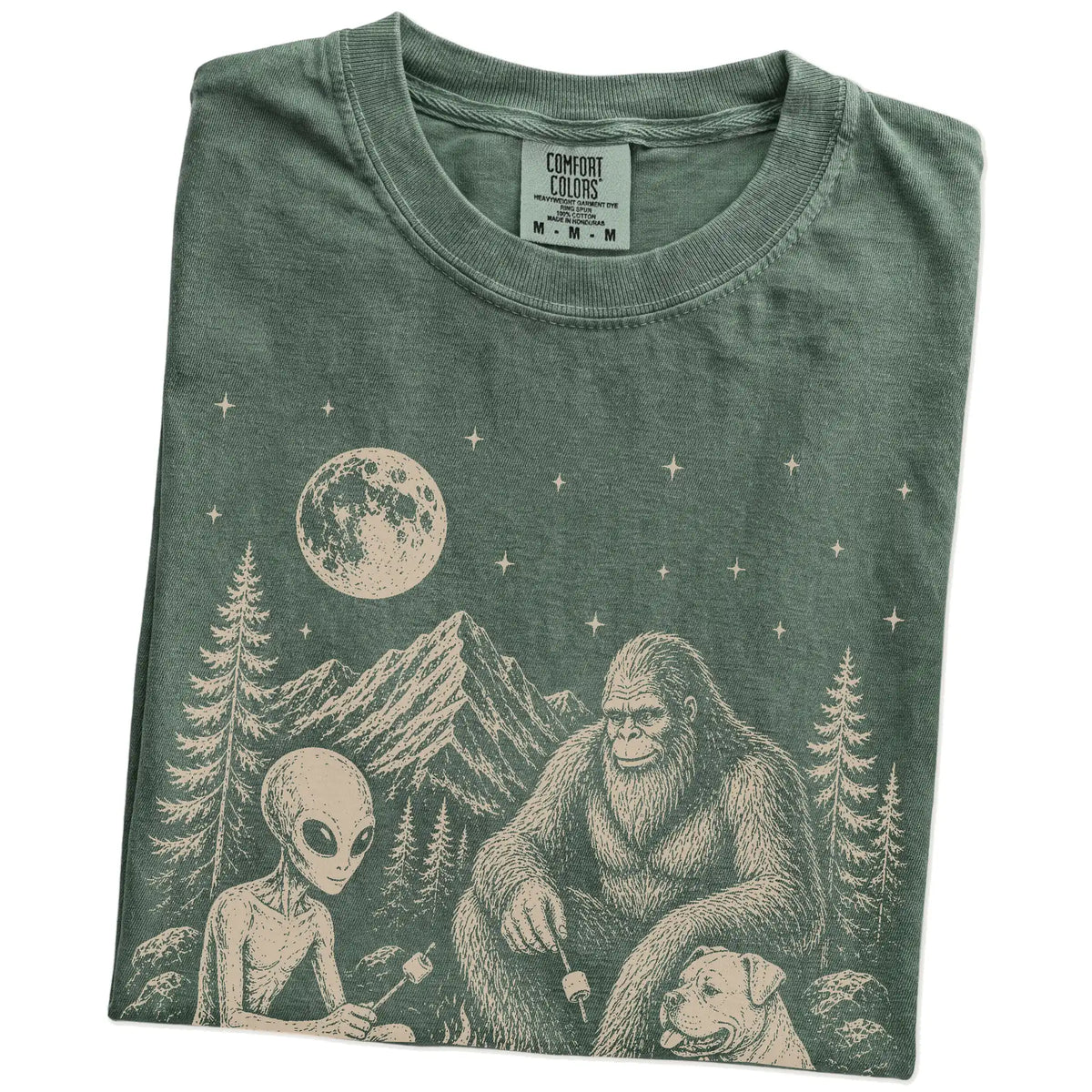 Folded Moss Comfort Colors® T-shirt showing American Bulldog camping with Bigfoot and an alien