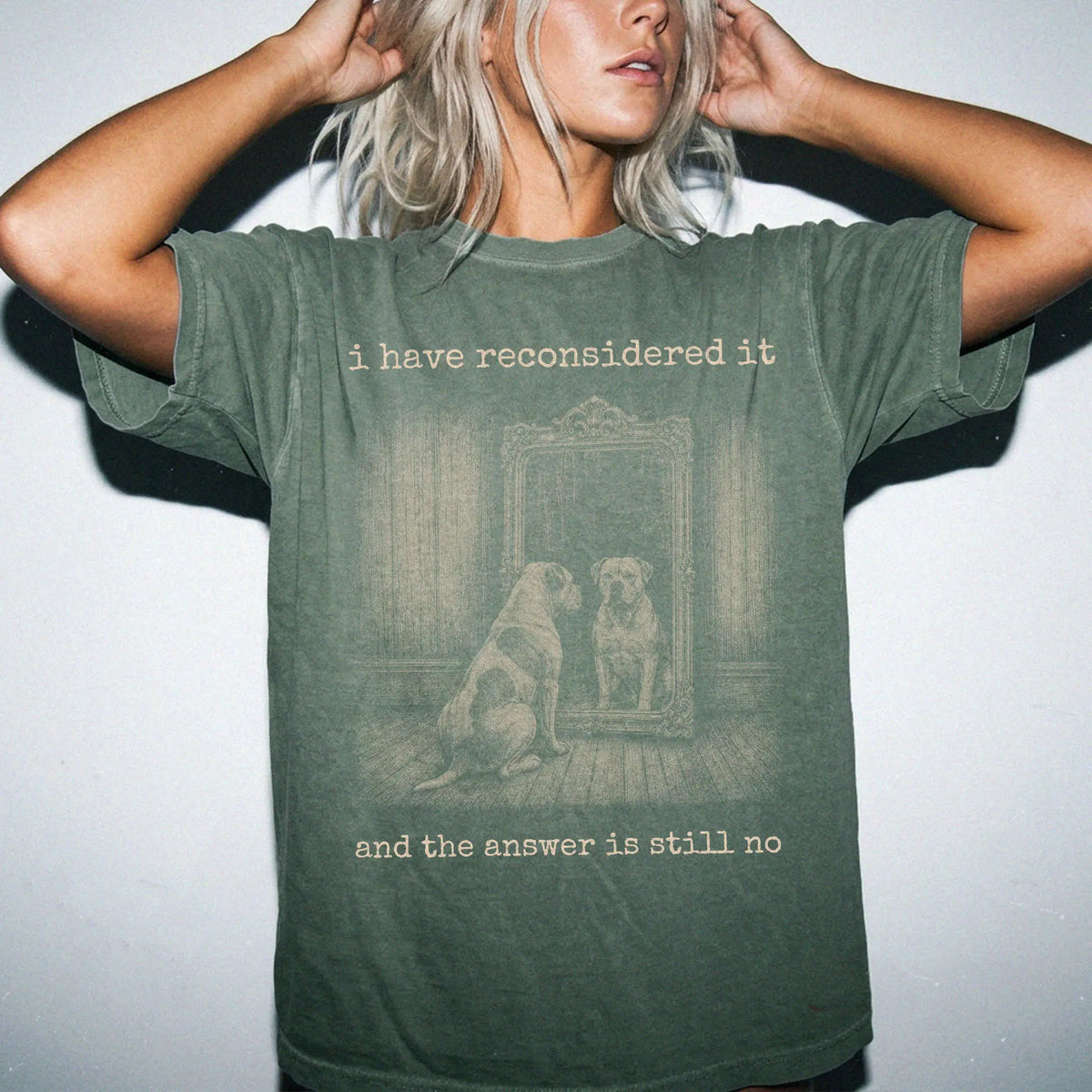 Model wearing a Moss Comfort Colors® T-shirt with “the answer is still no” american bulldog design