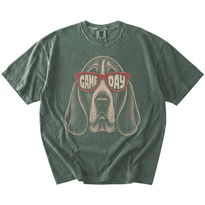 Basset Hound wearing red Game Day sunglasses on a Moss Comfort Colors® T-shirt