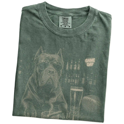 Folded Moss Comfort Colors® T-shirt showing Cane Corso with beer and football graphics