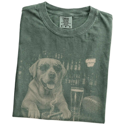 Folded Moss Comfort Colors® T-shirt showing Labrador Retriever with beer and football graphics