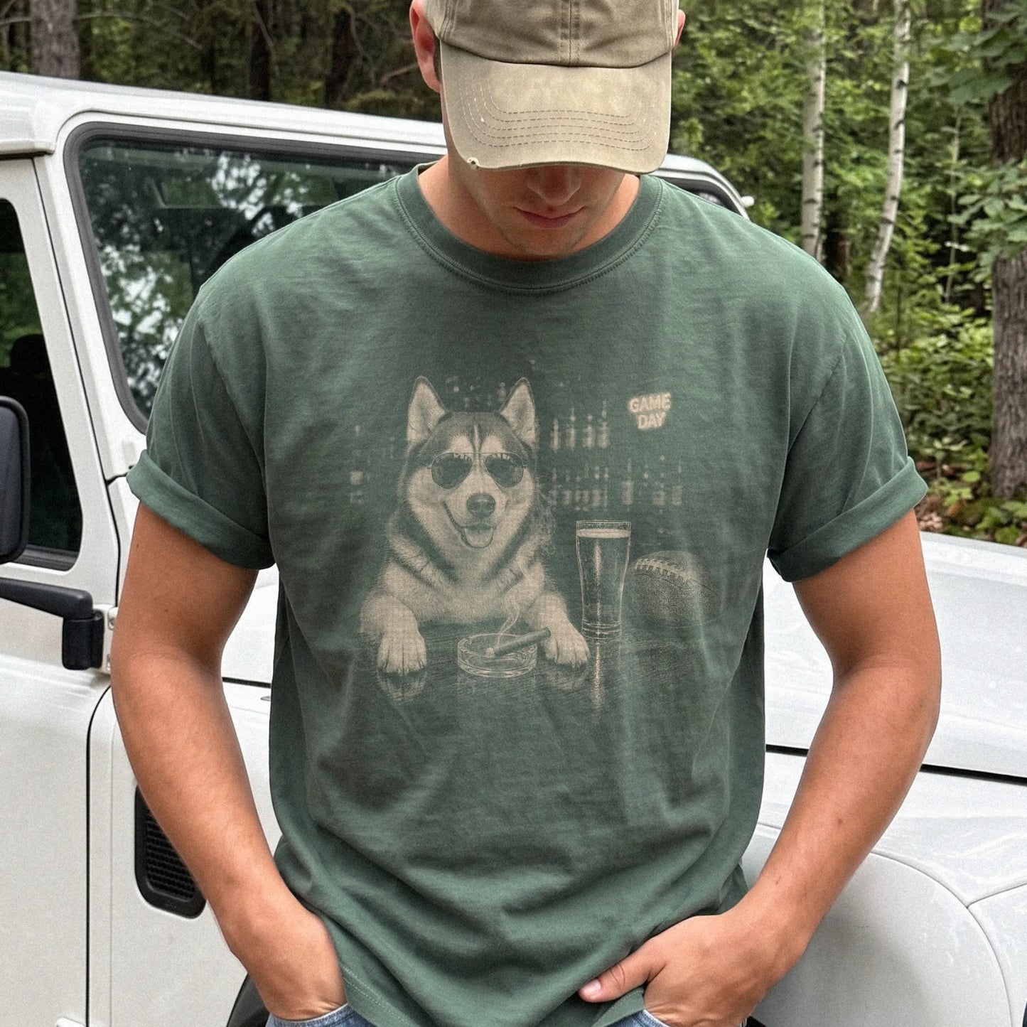 Model wearing a Moss Comfort Colors® T-shirt featuring Husky with beer and football graphics