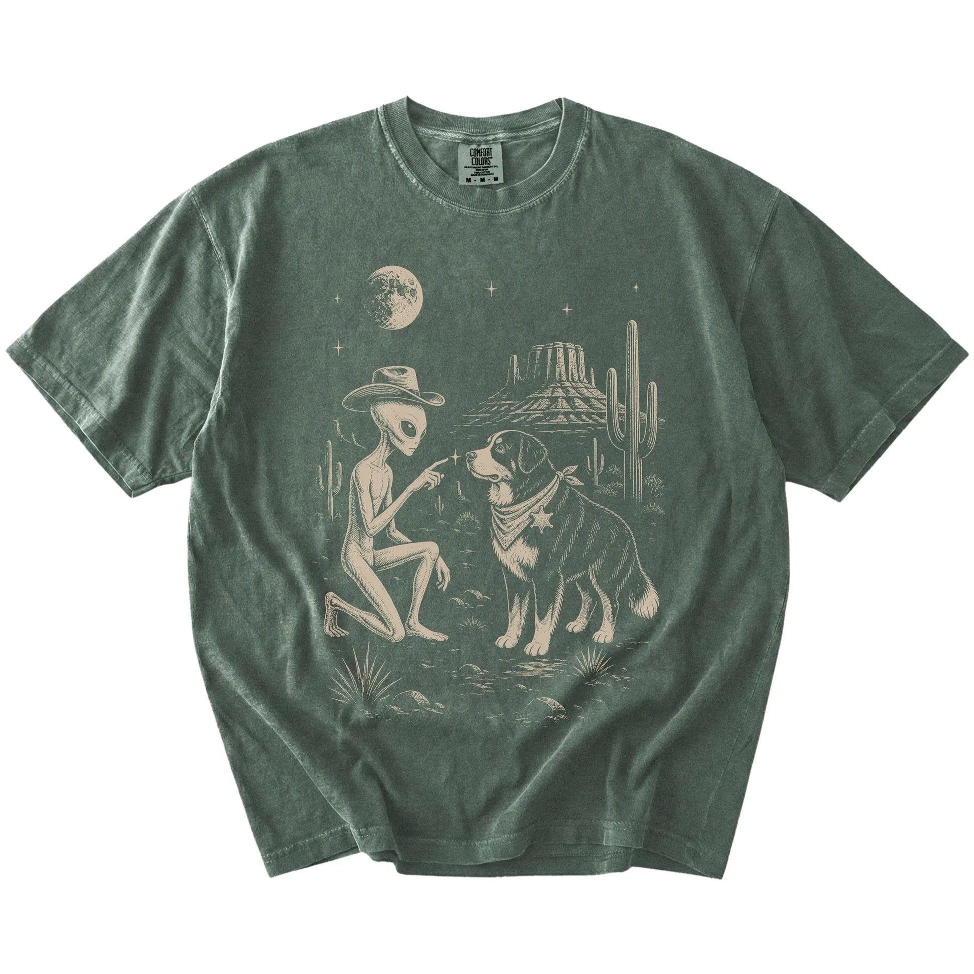 Cowboy alien fist-bumping a Bernese Mountain Dog beneath the moon on a Moss Comfort Colors® T-shirt