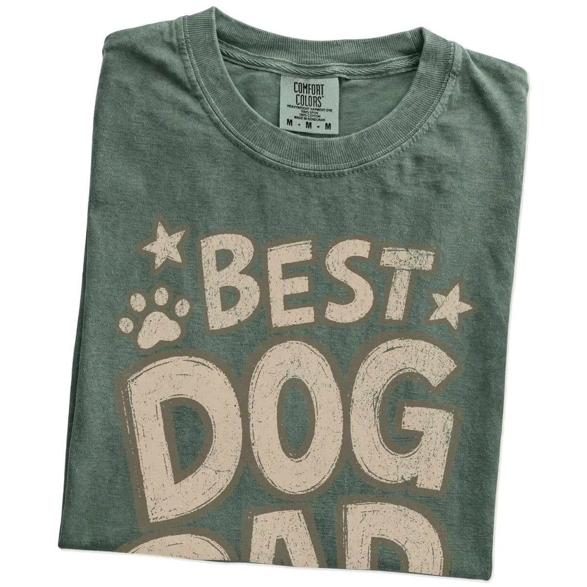 Folded Moss Comfort Colors® T-shirt showing best dog dad ever lettering