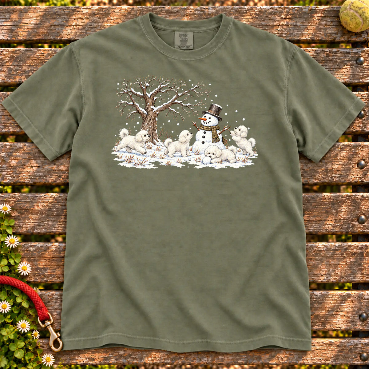 Bichon Frise puppies playing in snow with a snowman on a Moss T-shirt