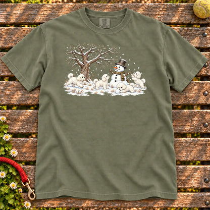 Bichon Frise puppies playing in snow with a snowman on a Moss T-shirt