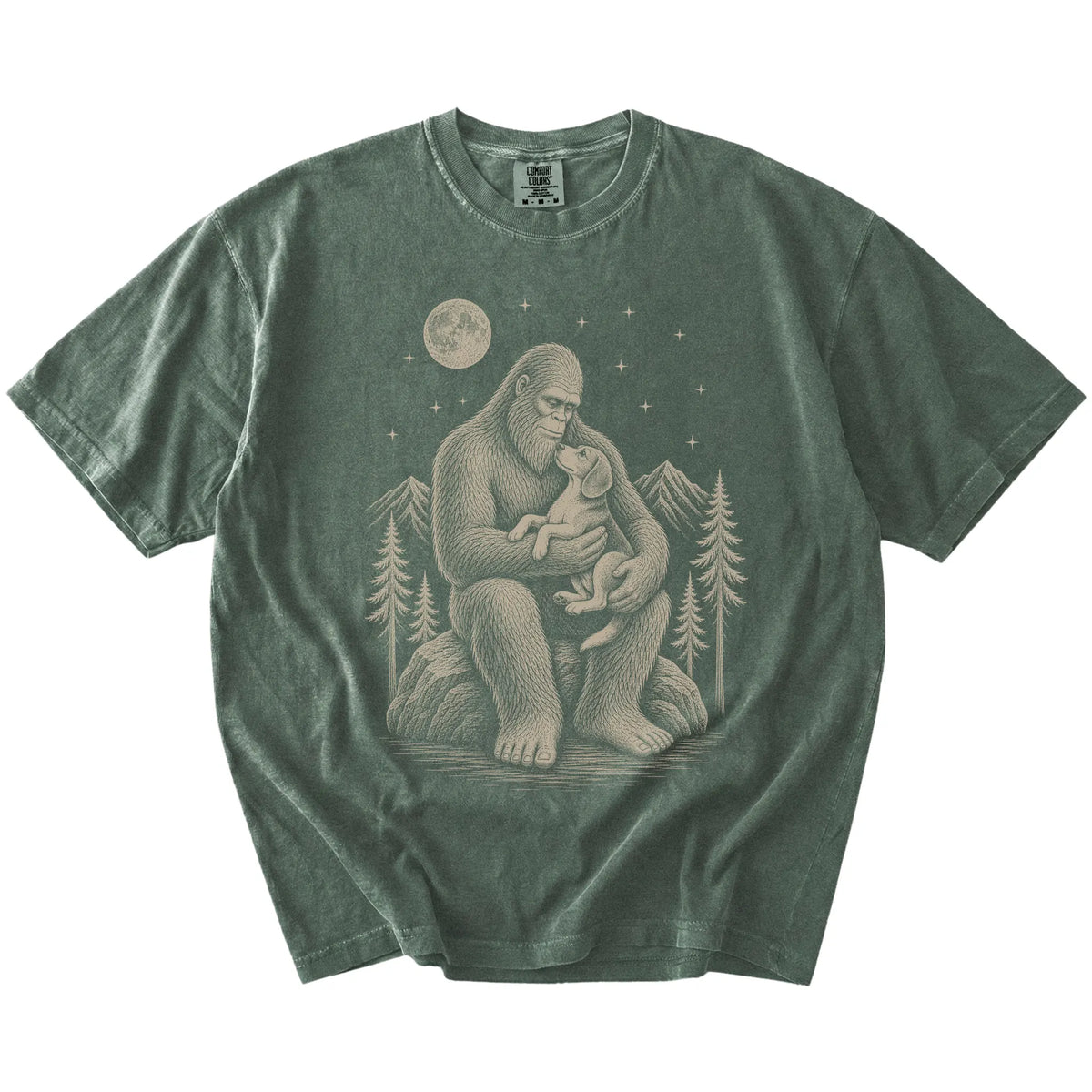 Bigfoot holding a Beagle on a Moss Comfort Colors® T-shirt