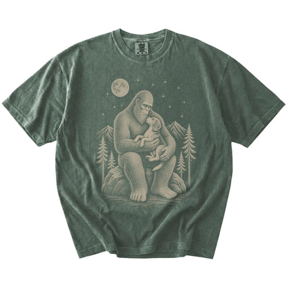 Bigfoot holding a Beagle on a Moss Comfort Colors® T-shirt