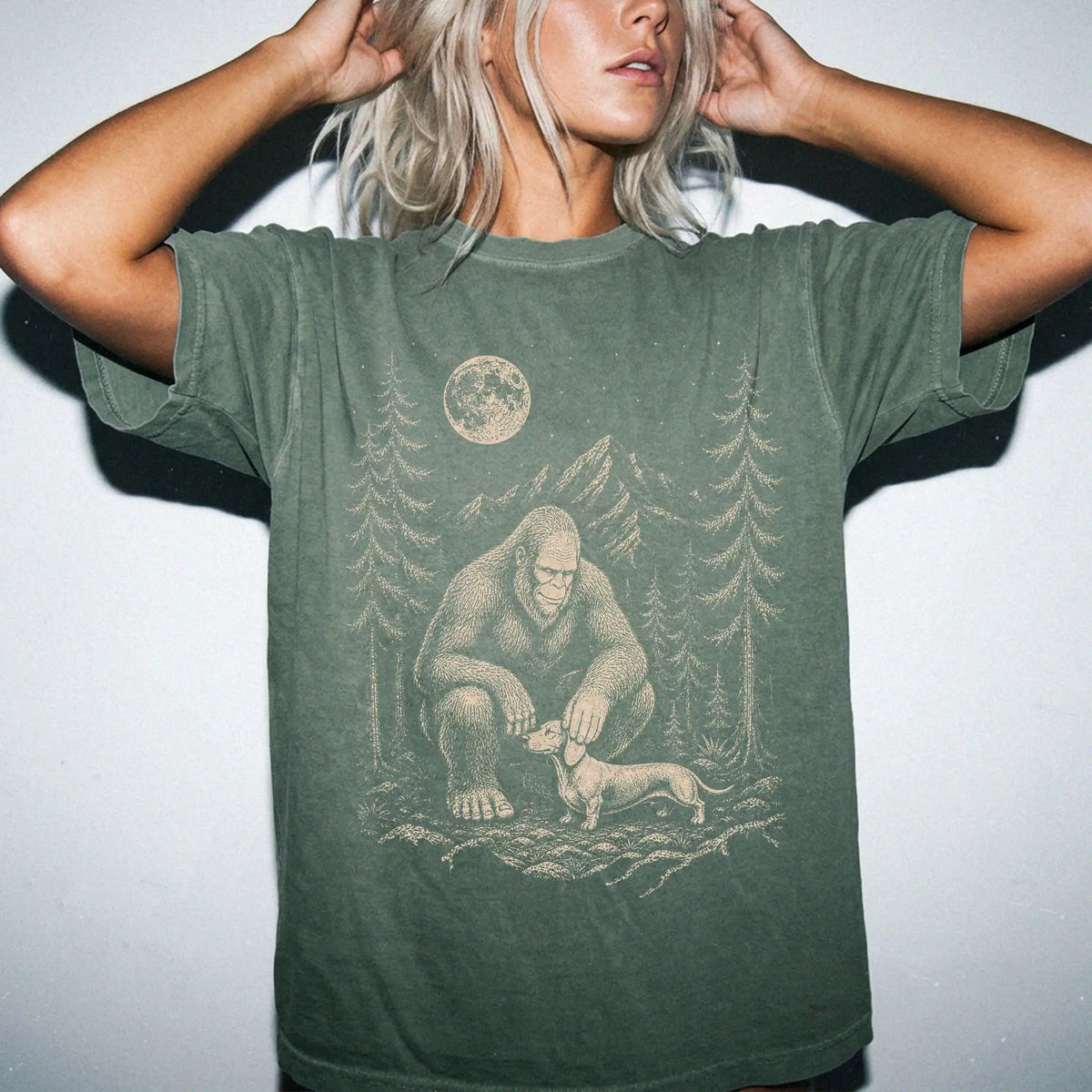 Person wearing the Dachshund and Bigfoot T-Shirt in Moss