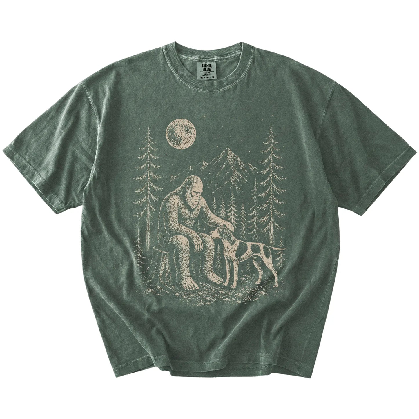 Bigfoot petting a Pointer beneath the moon in a pine forest on a Moss Comfort Colors® T-shirt