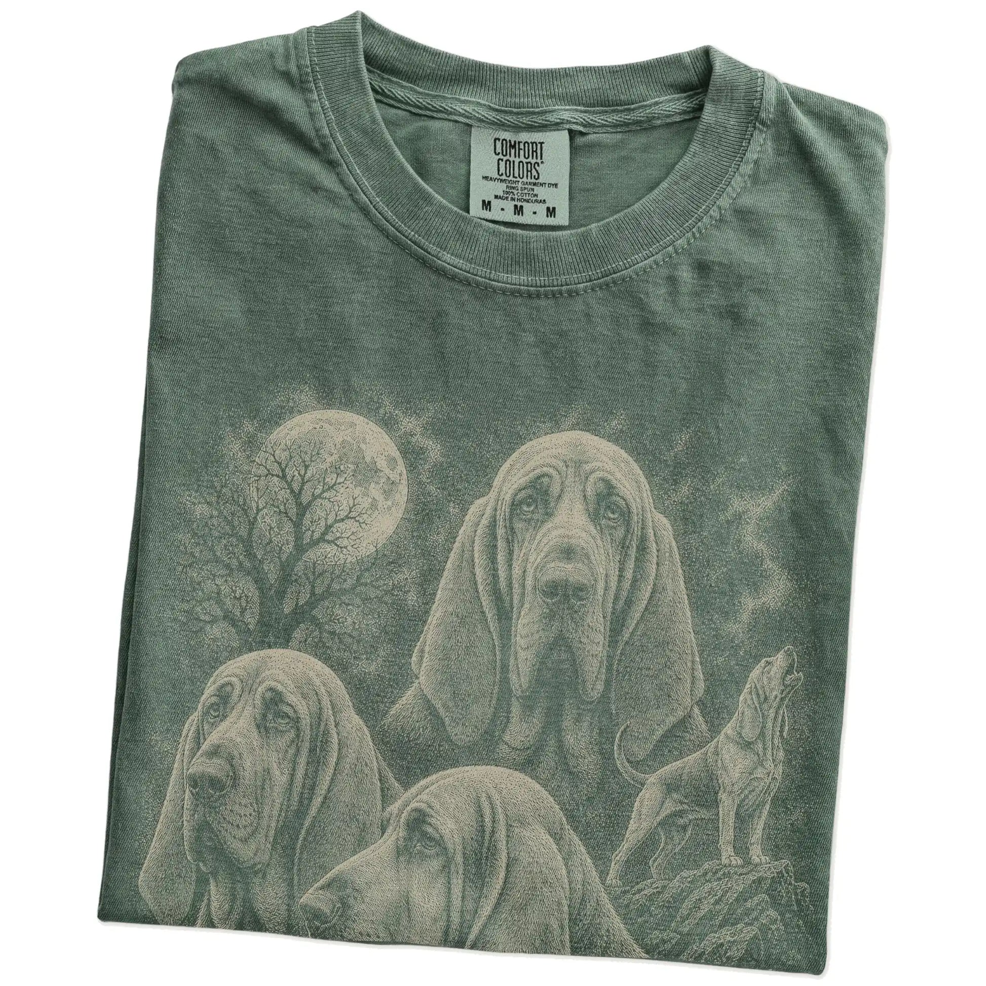 Folded Moss Comfort Colors® T-shirt showing a vintage moon montage featuring Bloodhound