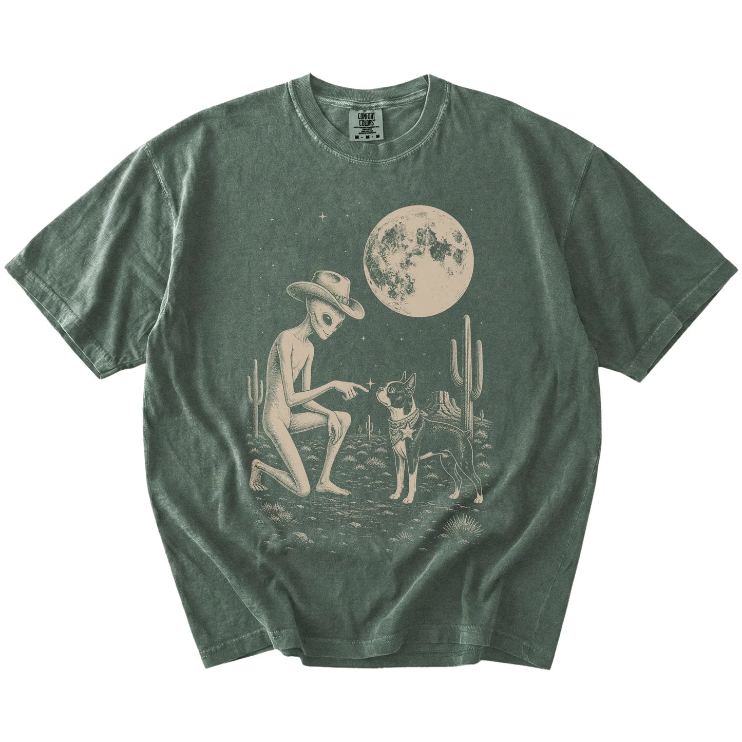 Cowboy alien fist-bumping a Boston Terrier beneath the moon on a Moss Comfort Colors® T-shirt
