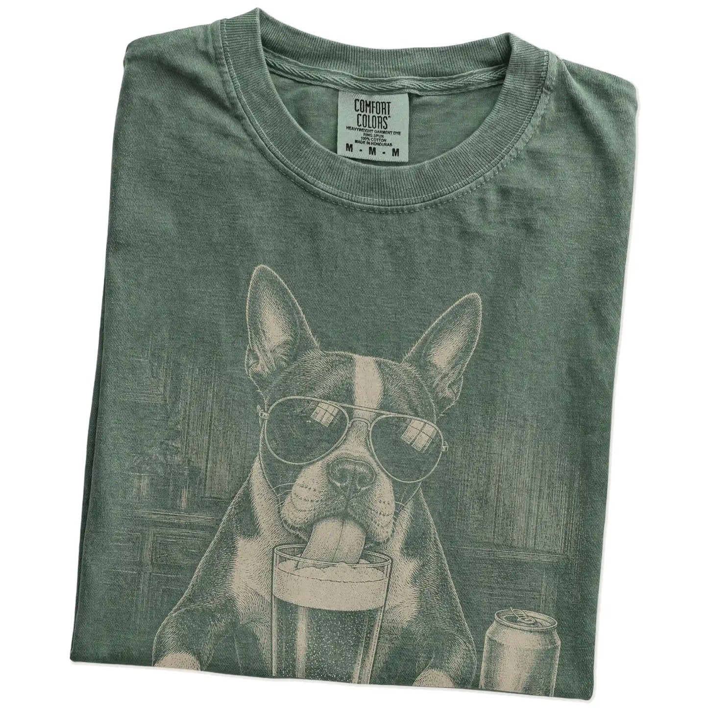 Folded Moss Comfort Colors® t-shirt showing Boston Terrier sneaking a drink from a pint