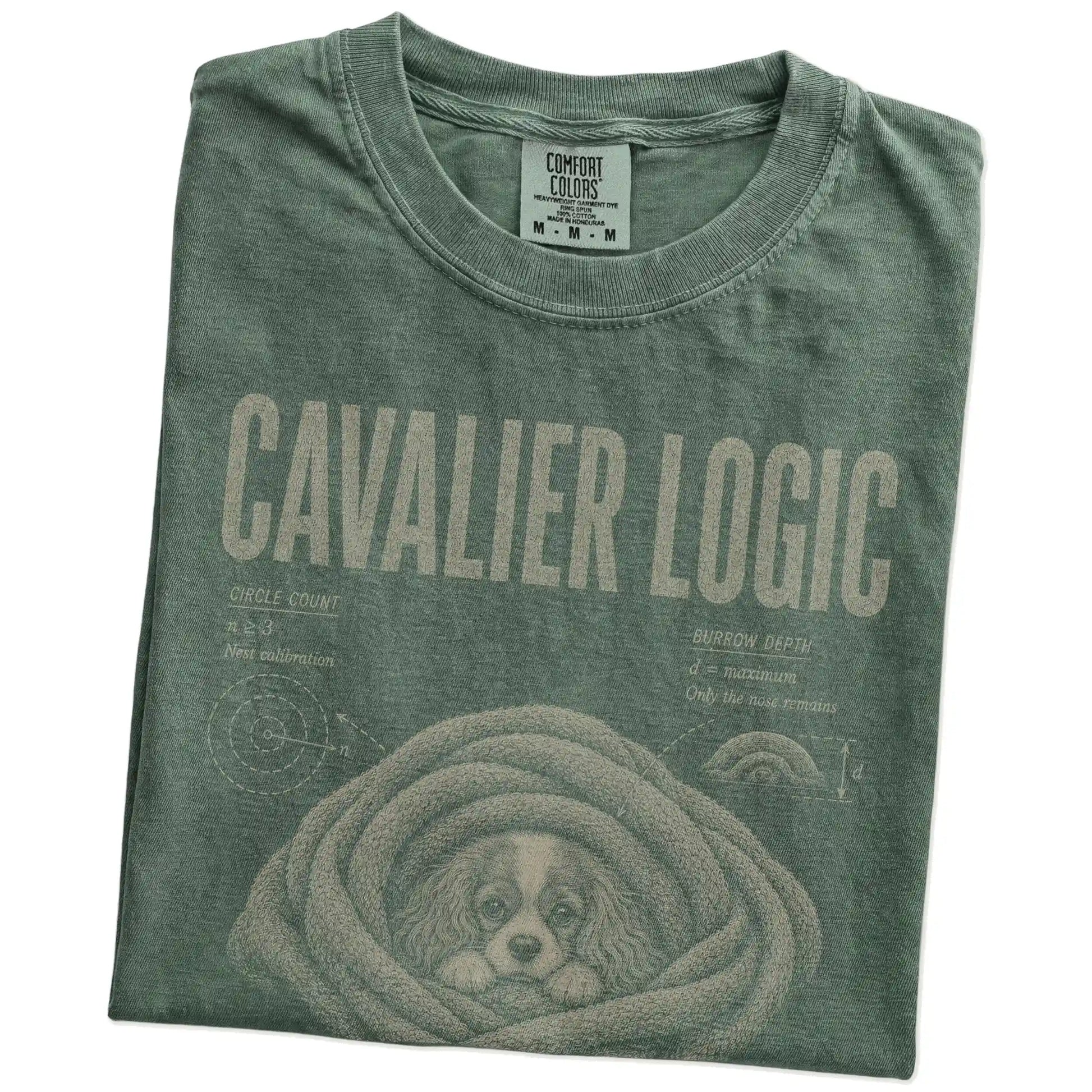 Folded Moss Cavalier King Charles Spaniel Logic T-Shirt showing the graphic
