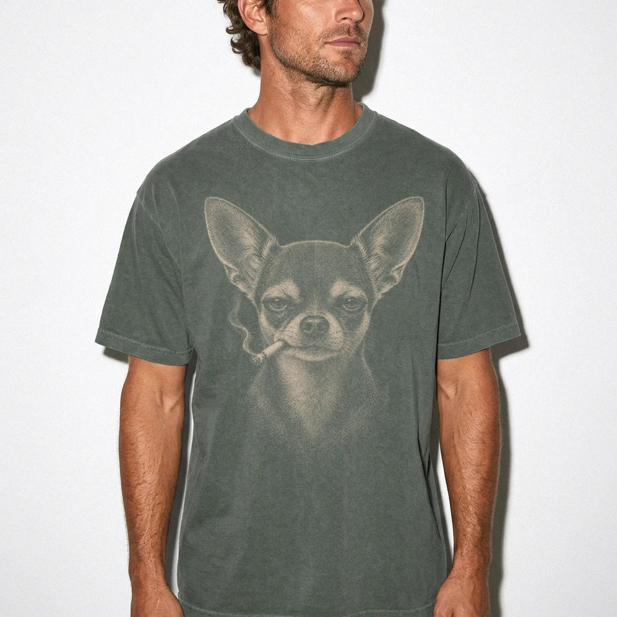 Model wearing a Chihuahua smoking design on a Moss t-shirt