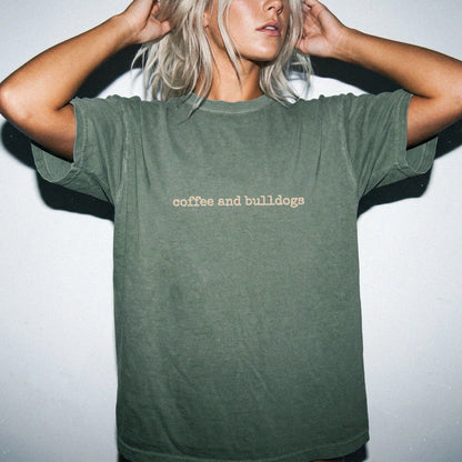 Model wearing a Moss Comfort Colors® T-shirt with “coffee and bulldogs” retro text