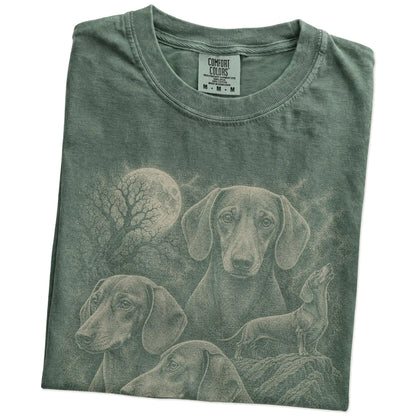 Folded Moss Comfort Colors® T-shirt showing a vintage moon montage featuring Dachshund
