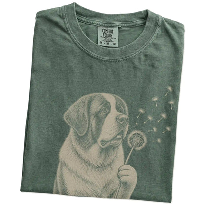 Folded Moss Comfort Colors® T-shirt showing Saint Bernard portrait with drifting dandelion seeds