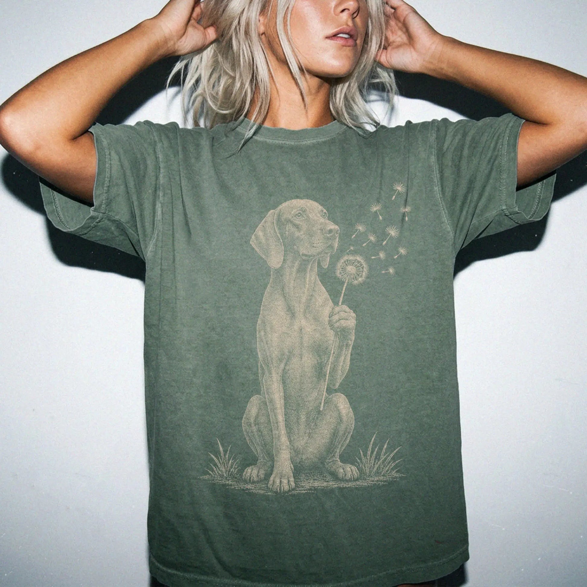 Model wearing a Moss Comfort Colors® T-shirt showing Vizsla portrait with drifting dandelion seeds