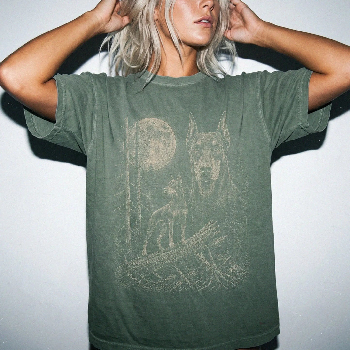 Woman wearing a Moss Doberman Moonlit Forest T-Shirt