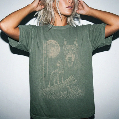 Woman wearing a Moss Doberman Moonlit Forest T-Shirt