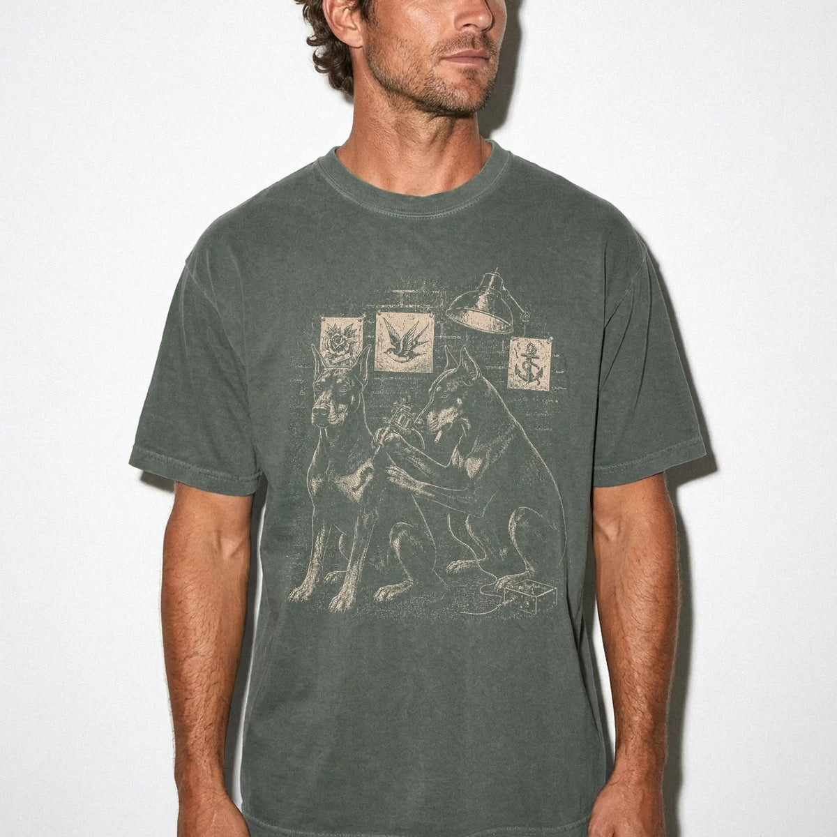 Person wearing a Moss Doberman Tattoo t-shirt