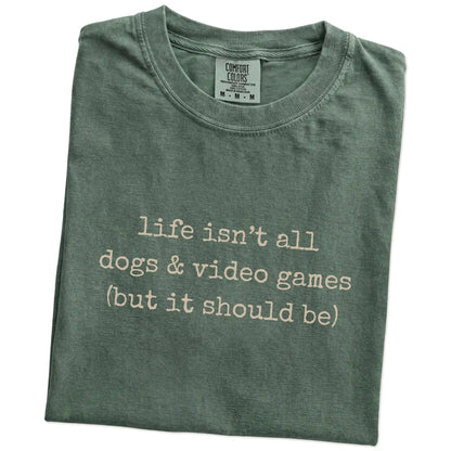 Folded Moss Comfort Colors® T-shirt showing dog-themed video games graphic