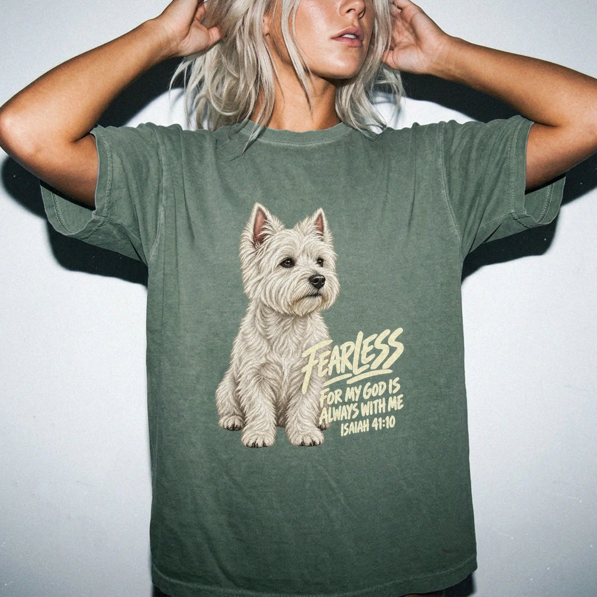 Woman wearing a moss Fearless Westie T-shirt with Isaiah 41:10