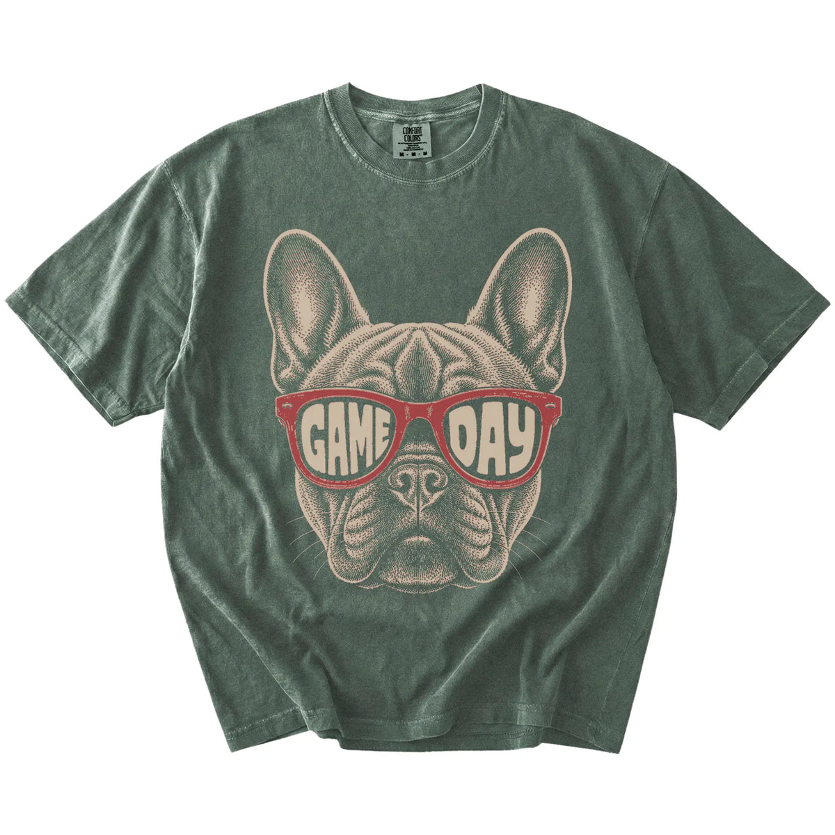 French Bulldog wearing red Game Day sunglasses on a Moss Comfort Colors® T-shirt