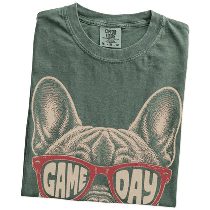 Folded Moss Comfort Colors® T-shirt showing french bulldog wearing red game day sunglasses