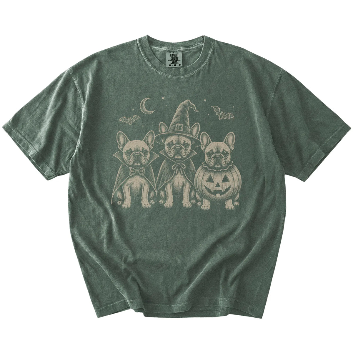 Three French Bulldog dogs dressed for Halloween beneath bats and a crescent moon on a Moss Comfort Colors® T-shirt