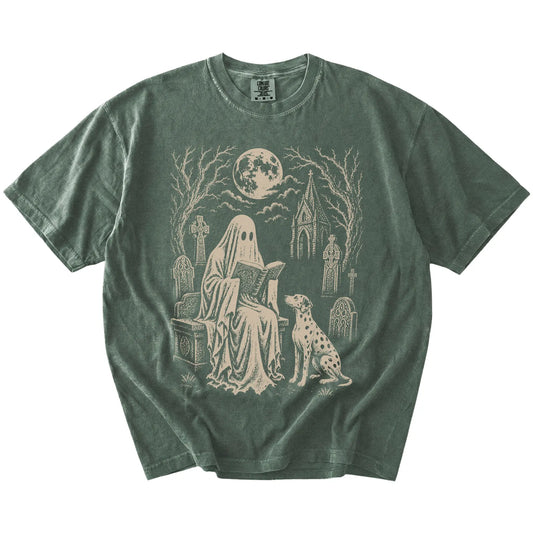 Dalmatian beside a reading ghost in a moonlit graveyard on a Moss Comfort Colors® T-shirt