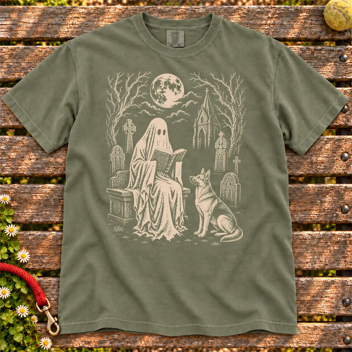 German Shepherd beside a reading ghost in a moonlit graveyard on a Moss Comfort Colors® T-shirt