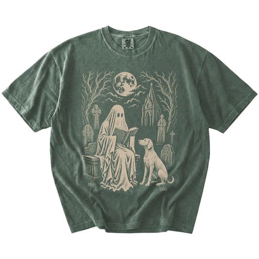 Weimaraner beside a reading ghost in a moonlit graveyard on a Moss Comfort Colors® T-shirt