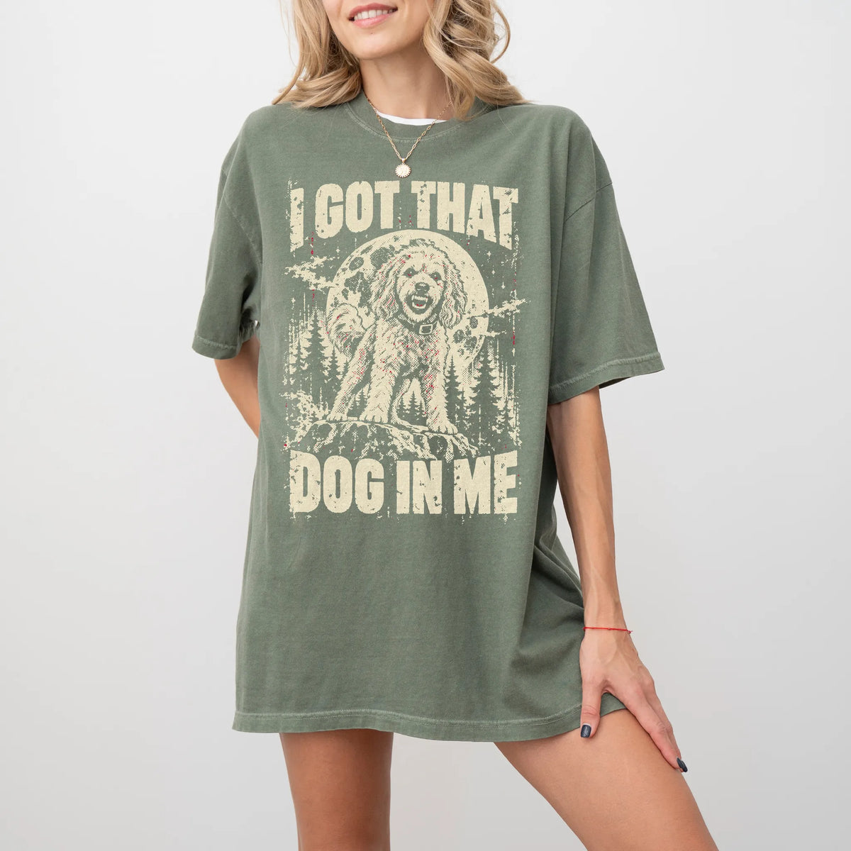 Moss Goldendoodle I Got That Dog in Me T-shirt, worn by a model