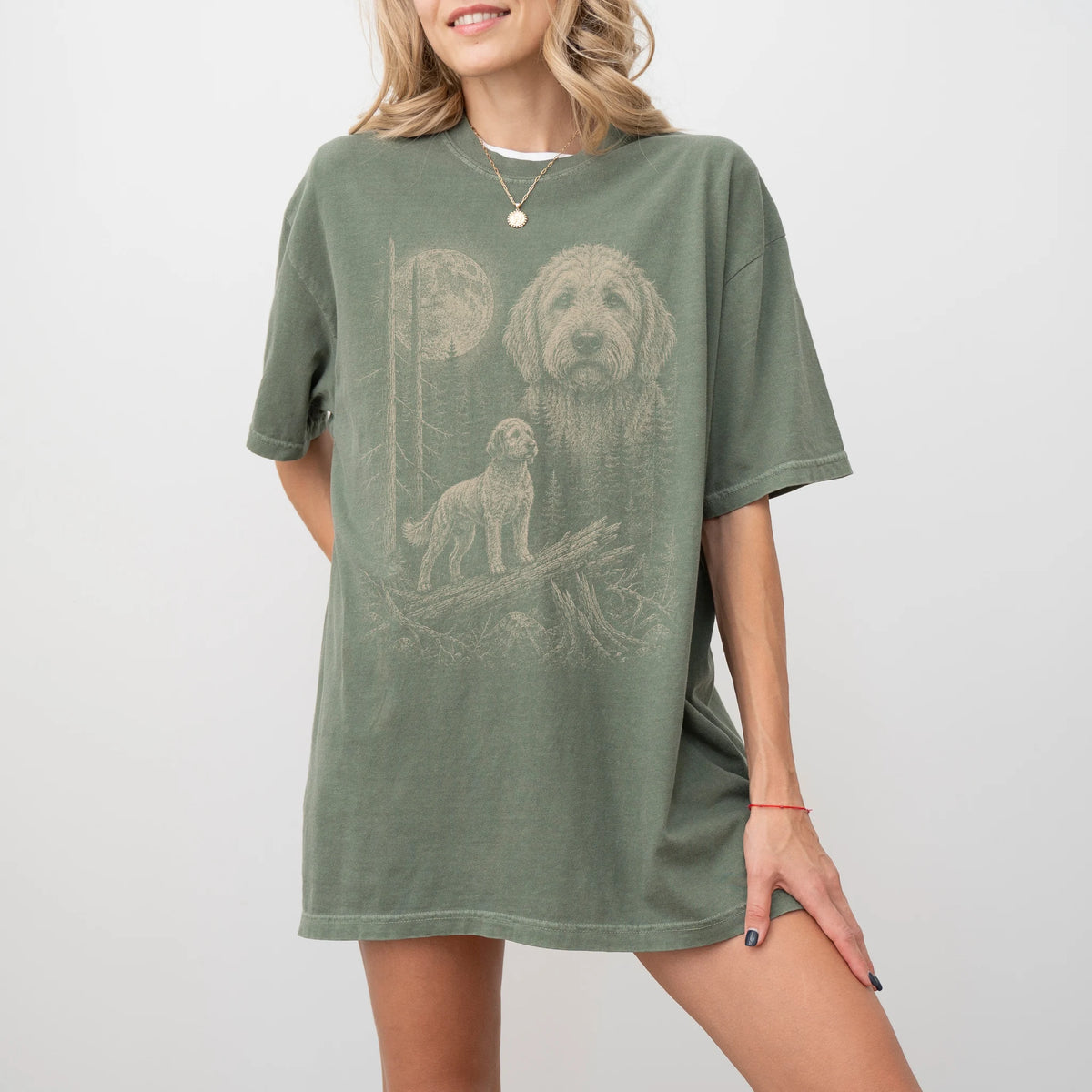 Woman wearing a Moss Goldendoodle Moonlit Forest T-Shirt