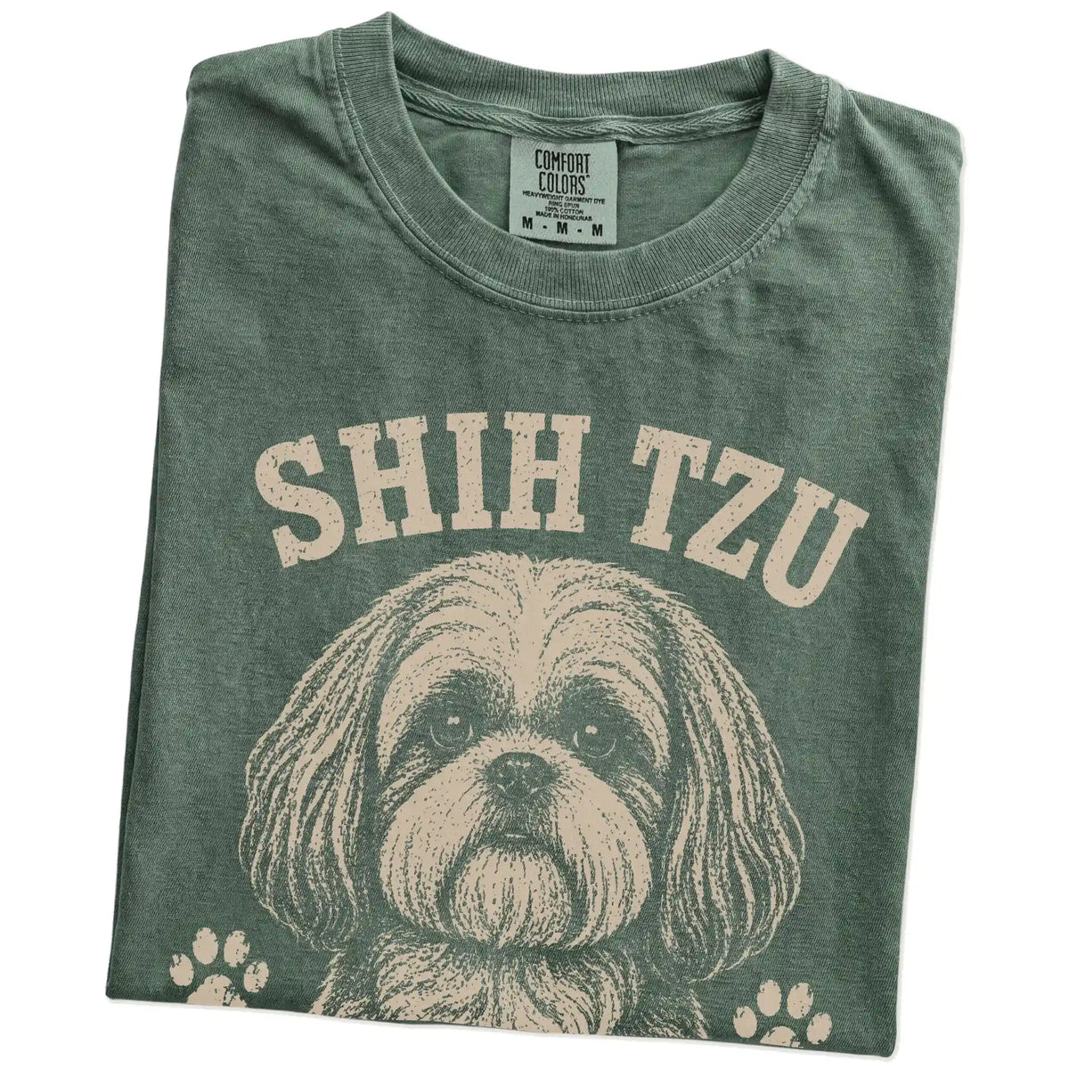 Folded Moss Comfort Colors® T-shirt showing Shih Tzu design with “High Maintenance & Worth It” lettering