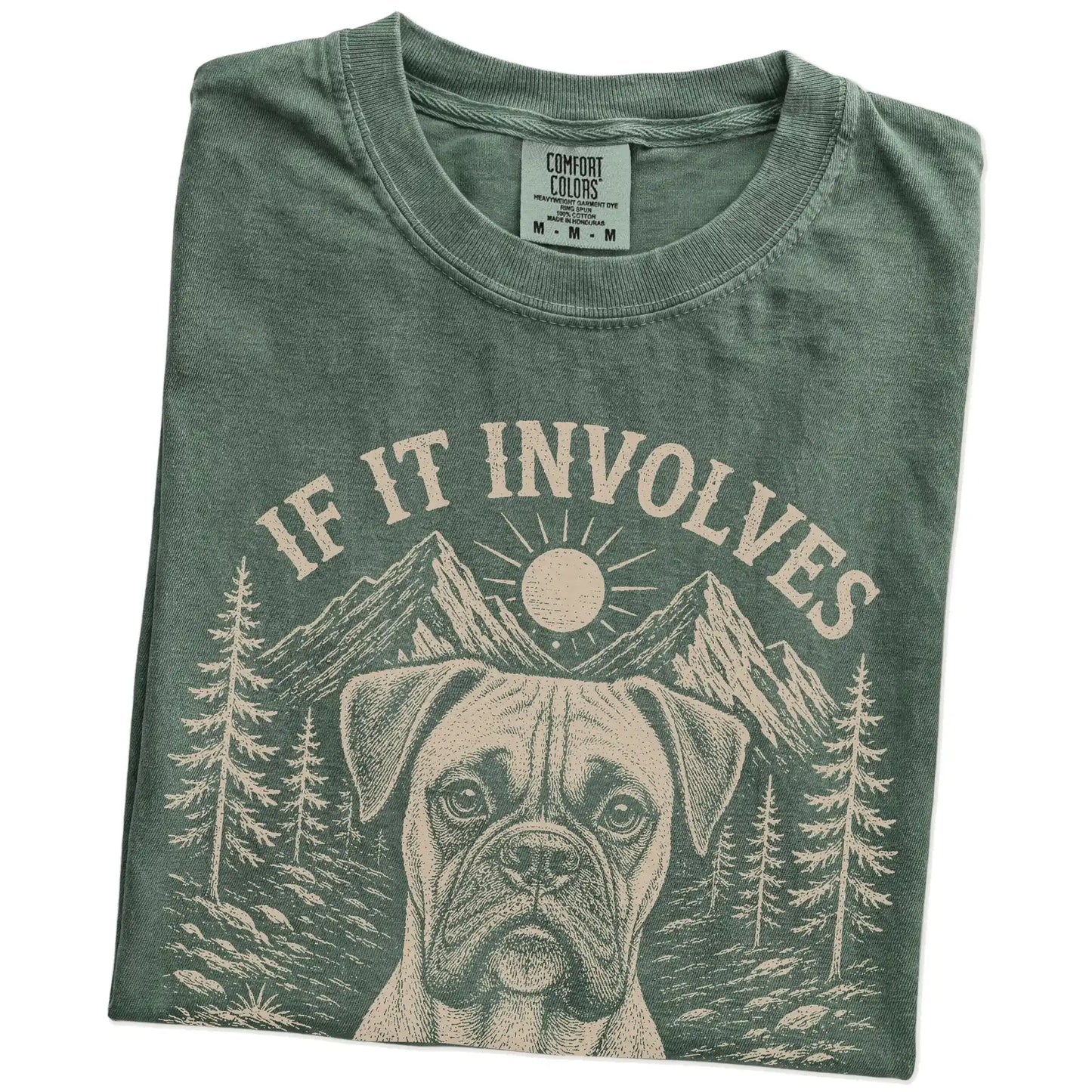 Folded Moss Comfort Colors® T-shirt showing Boxer hiking design with mountain scenery