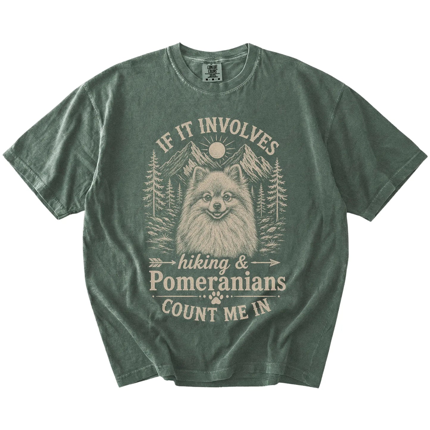 Pomeranian hiking design with mountain scenery on a Moss Comfort Colors® T-shirt