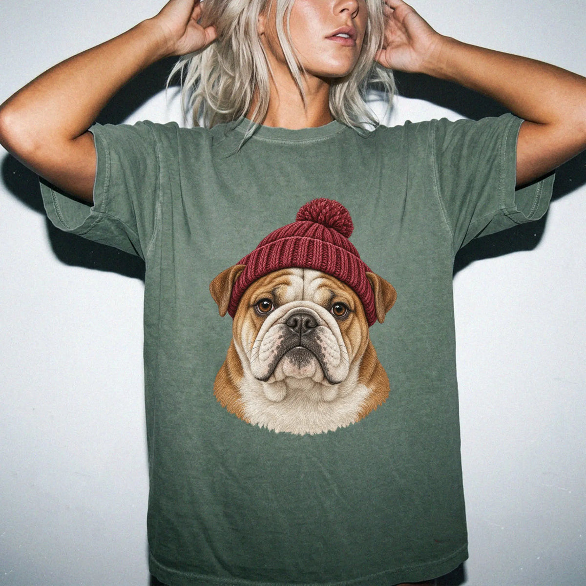 Woman wearing a Moss Bulldog hipster T-shirt with a maroon-beanie dog portrait