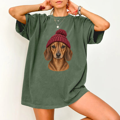 Woman wearing a Moss Dachshund hipster T-shirt with a maroon-beanie dog portrait